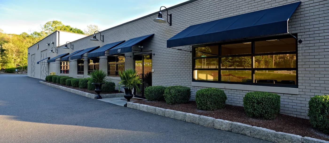 Liquidation Pallet Deals warehouse exterior in Beacon Falls, Connecticut